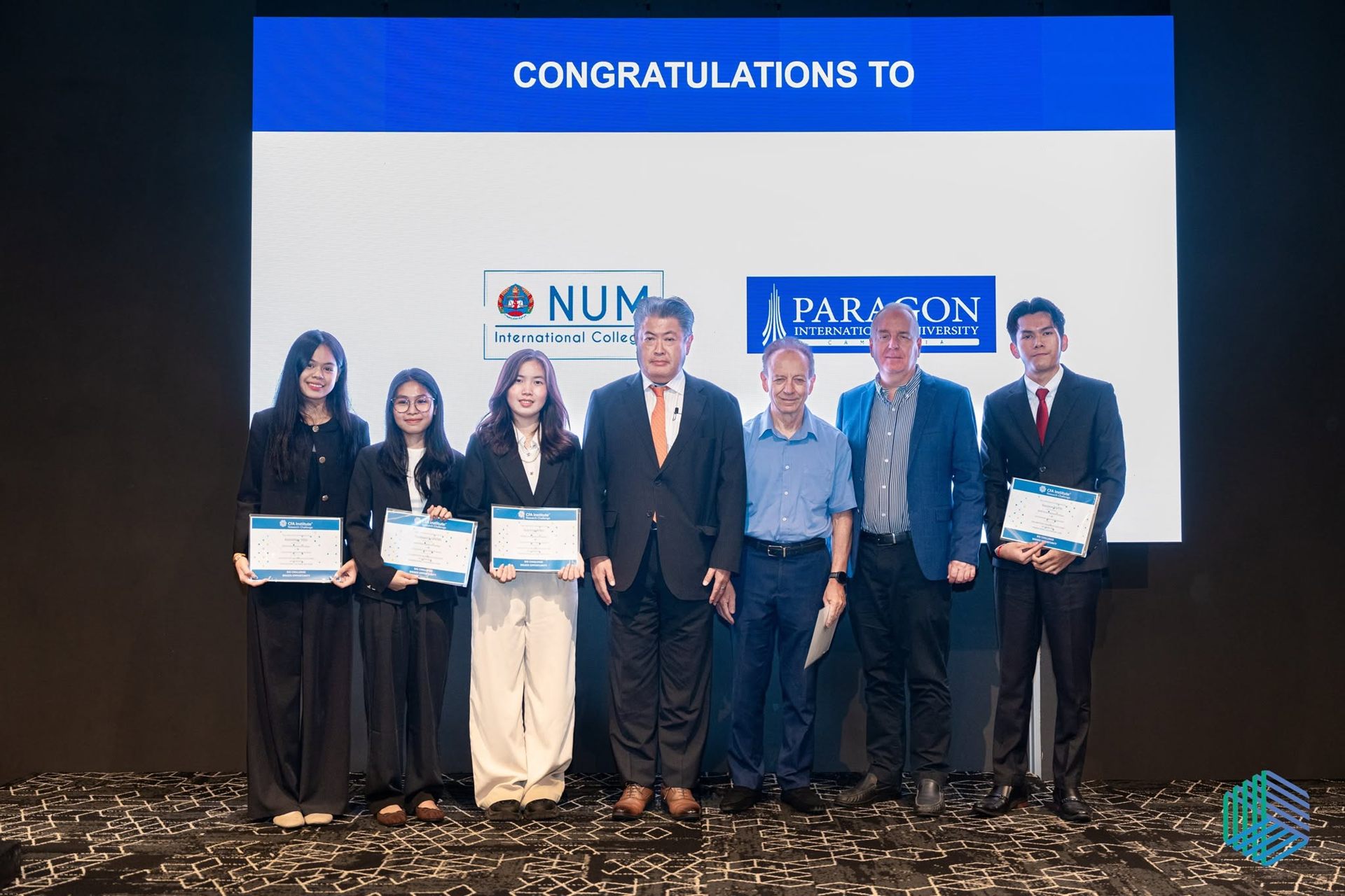 CFA Institute Research Challenge: the NUM International College team with their certificates