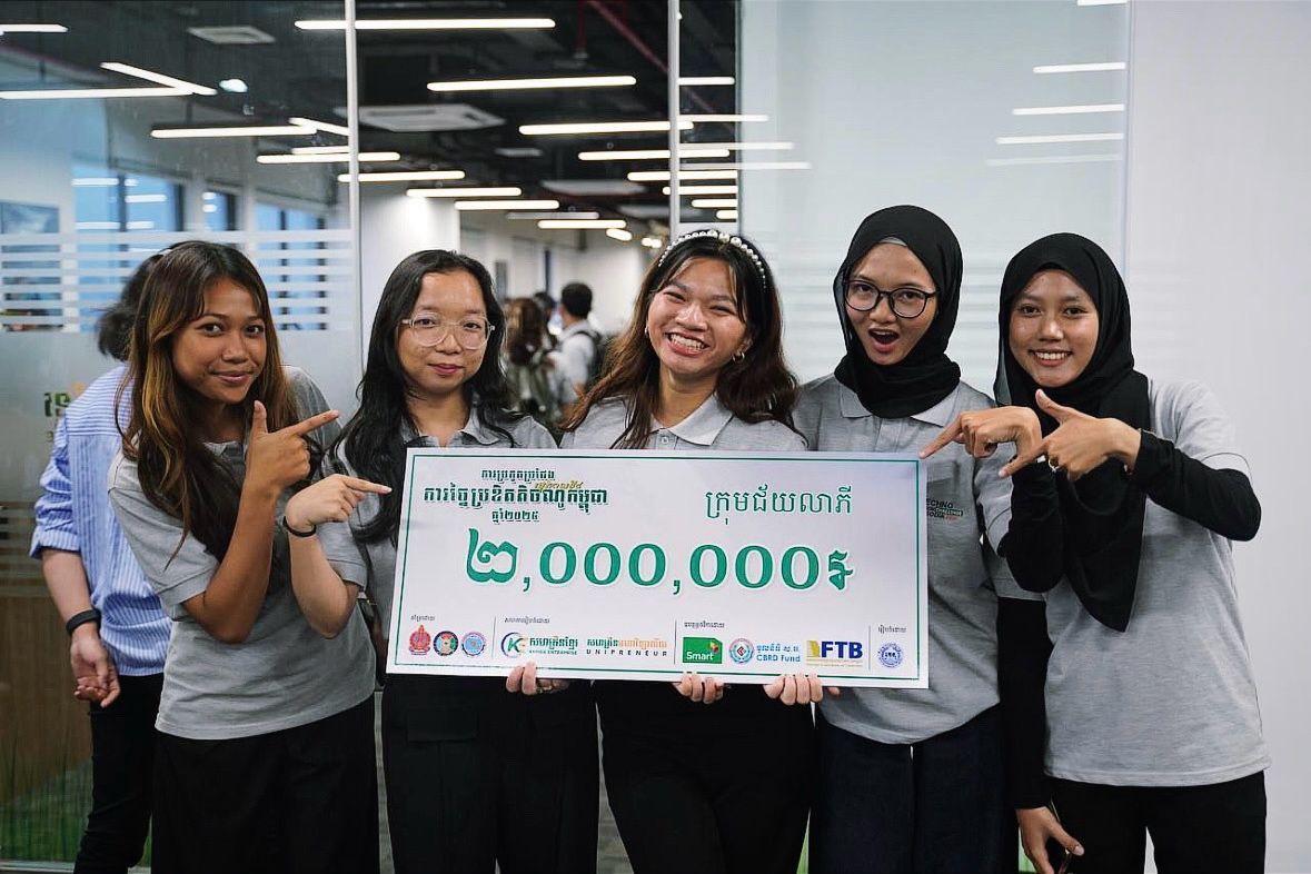 A winning team with their 2,000,000 riel prize, Techno Innovation Challenge Cambodia 2025
